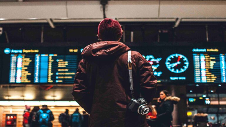 Airport departure board Credit Erik Odiin Unsplash scaled