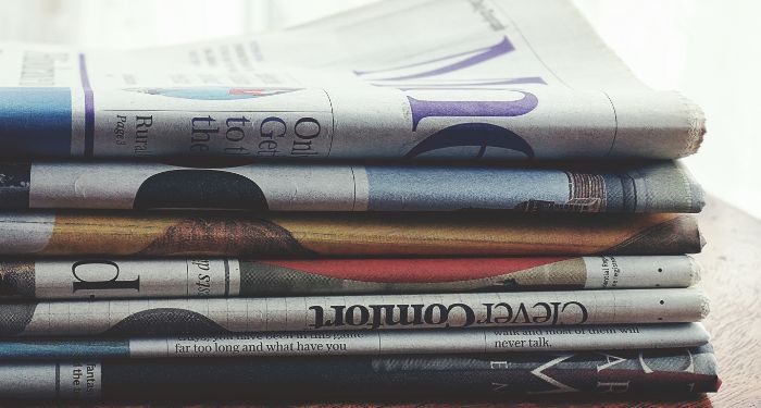 image of stack of newspapers.jpg.optimal